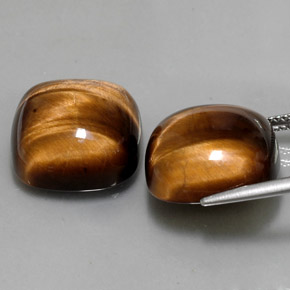 Gemas de tiger's eye marrón natural de  ct, corte cojín, opaco