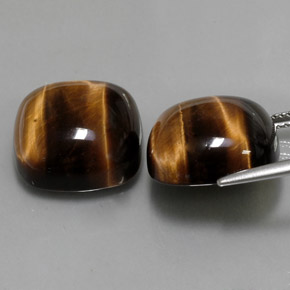 Gemas de tiger's eye marrón natural de  ct, corte cojín, opaco