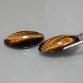 Gemas de tiger's eye marrón natural de  ct, marquesa, opaco