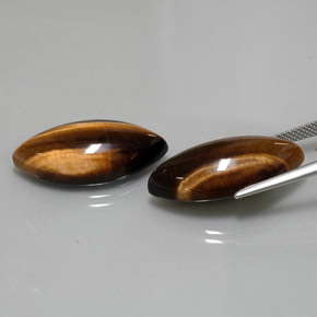 Gemas de tiger's eye marrón natural de  ct, marquesa, opaco