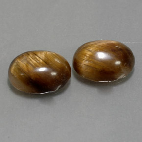 Gemas de tiger's eye marrón natural de  ct, corte óvalo, opaco