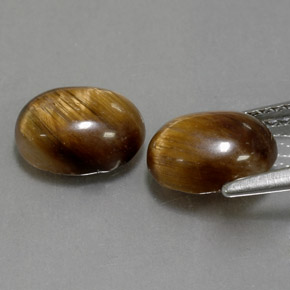 Gemas de tiger's eye marrón natural de  ct, corte óvalo, opaco