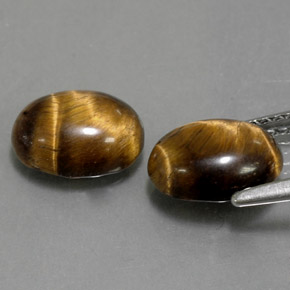 Gemas de tiger's eye marrón natural de  ct, corte óvalo, opaco