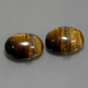 Gemas de tiger's eye marrón natural de  ct, corte óvalo, opaco