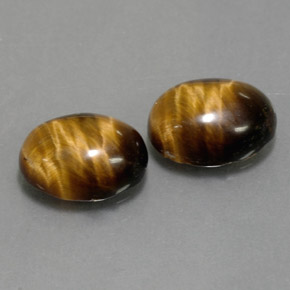 Gemas de tiger's eye marrón natural de  ct, corte óvalo, opaco