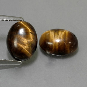 Gemas de tiger's eye marrón natural de  ct, corte óvalo, opaco