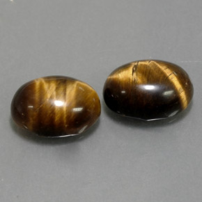 Gemas de tiger's eye marrón natural de  ct, corte óvalo, opaco