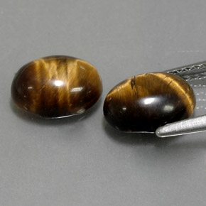 Gemas de tiger's eye marrón natural de  ct, corte óvalo, opaco