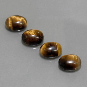 Gemas de tiger's eye marrón natural de  ct, corte óvalo, opaco