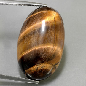 Tiger's eye marrón natural de 26,13 ct, corte óvalo, opaco