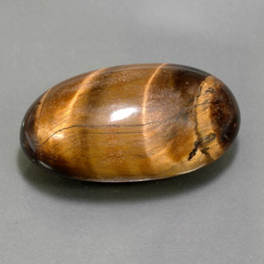 Tiger's eye marrón natural de 26,13 ct, corte óvalo, opaco