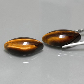 Gemas de tiger's eye marrón natural de  ct, marquesa, opaco