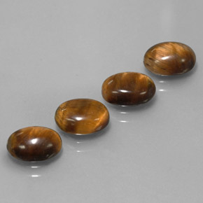 Gemas de tiger's eye marrón natural de  ct, corte óvalo, opaco