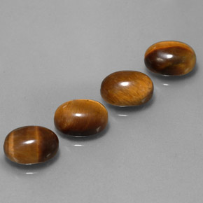 Gemas de tiger's eye marrón natural de  ct, corte óvalo, opaco
