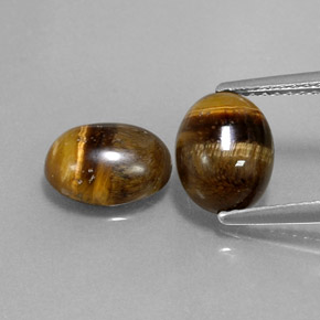 Gemas de tiger's eye marrón natural de  ct, corte óvalo, opaco