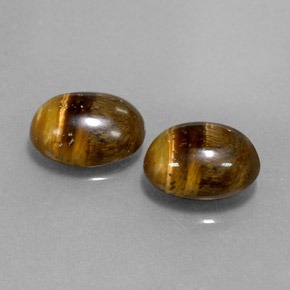 Gemas de tiger's eye marrón natural de  ct, corte óvalo, opaco