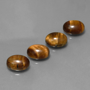 Gemas de tiger's eye marrón natural de  ct, corte óvalo, opaco