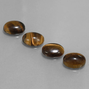 Gemas de tiger's eye marrón natural de  ct, corte óvalo, opaco