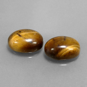 Gemas de tiger's eye marrón natural de  ct, corte óvalo, opaco