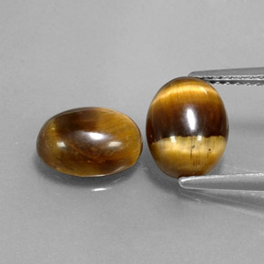 Gemas de tiger's eye marrón natural de  ct, corte óvalo, opaco