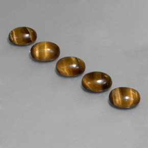 Gemas de tiger's eye marrón natural de  ct, corte óvalo, opaco