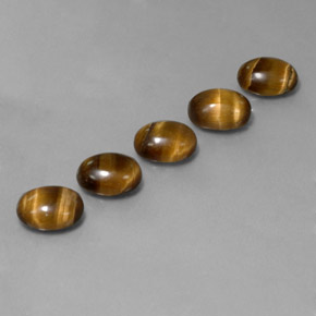 Gemas de tiger's eye marrón natural de  ct, corte óvalo, opaco