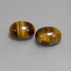 Gemas de tiger's eye marrón natural de  ct, corte óvalo, opaco