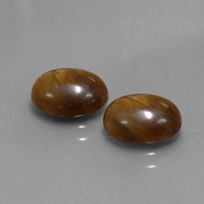 Gemas de ojo de tigre marrón natural de  ct, corte óvalo, opaco
