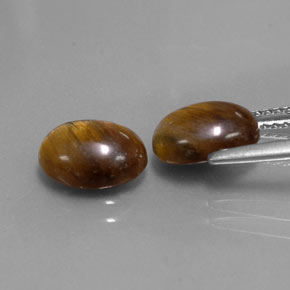 Gemas de ojo de tigre marrón natural de  ct, corte óvalo, opaco