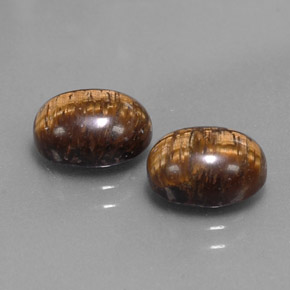 Gemas de tiger's eye marrón natural de  ct, corte óvalo, opaco