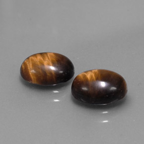 Gemas de tiger's eye marrón natural de  ct, corte óvalo, opaco