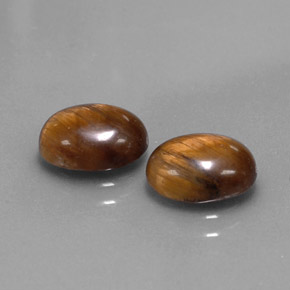 Gemas de tiger's eye marrón natural de  ct, corte óvalo, opaco