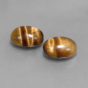 Gemas de tiger's eye marrón natural de  ct, corte óvalo, opaco