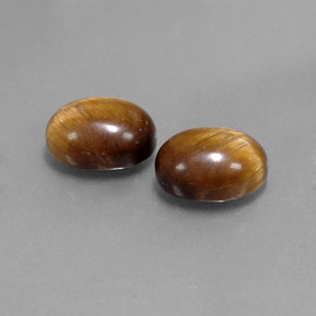 Gemas de tiger's eye marrón natural de  ct, corte óvalo, opaco