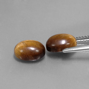 Gemas de tiger's eye marrón natural de  ct, corte óvalo, opaco