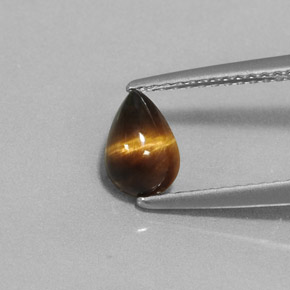 Tiger's eye marrón natural de 0,70 ct, en forma de pera, opaco