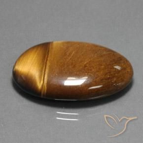 Ojo de Tigre Marrón cálido natural de 33.65 ct, Ovalada, Opaco