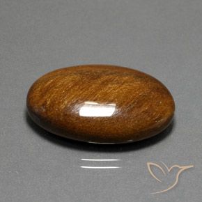 Ojo de Tigre Marrón canela intenso natural de 33.96 ct, Ovalada, Opaco