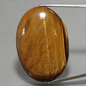 Tiger's eye marrón natural de 68,47 ct, corte óvalo, opaco
