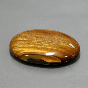 Tiger's eye marrón natural de 68,47 ct, corte óvalo, opaco