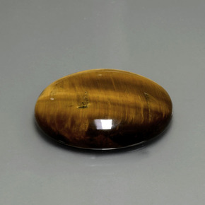Tiger's eye marrón natural de 22,43 ct, corte óvalo, opaco
