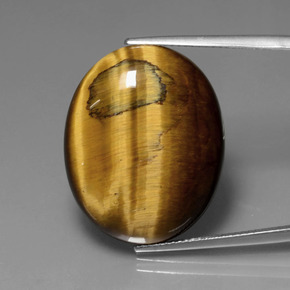 Tiger's eye marrón natural de 22,74 ct, corte óvalo, opaco