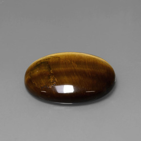 Tiger's eye marrón natural de 22,74 ct, corte óvalo, opaco