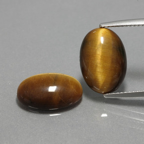 Gemas de tiger's eye marrón natural de  ct, corte óvalo, opaco