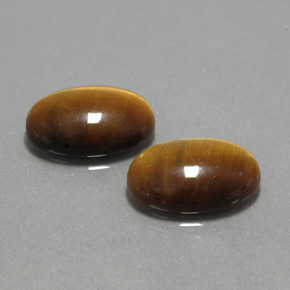 Gemas de tiger's eye marrón natural de  ct, corte óvalo, opaco