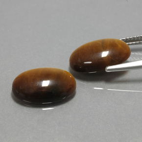 Gemas de tiger's eye marrón natural de  ct, corte óvalo, opaco