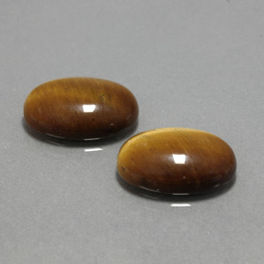 Gemas de tiger's eye marrón natural de  ct, corte óvalo, opaco