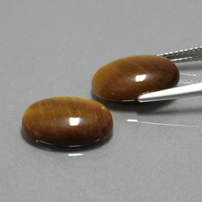 Gemas de tiger's eye marrón natural de  ct, corte óvalo, opaco