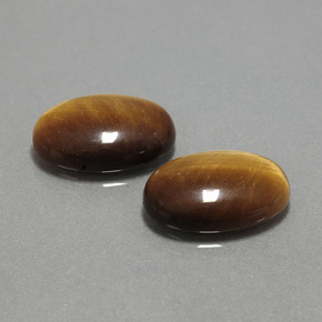 Gemas de tiger's eye marrón natural de  ct, corte óvalo, opaco