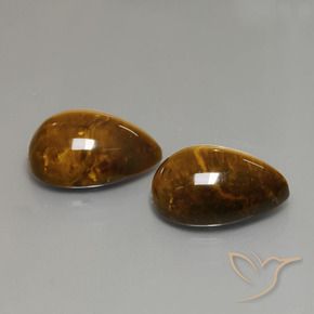 Gemas de Ojo de Tigre Marrón cálido natural de 22.82 ct, En forma de pera, Opaco